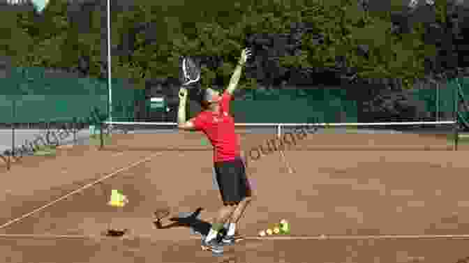 A Tennis Player Performing A Serve, Preparing To Hit The Ball Over The Net How To Win The Tennis Game: Tennis Player S Guide To Being Mentally Tough