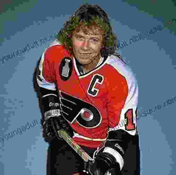 Bobby Clarke, A Legendary Hockey Player Known For His Leadership And Perseverance, Poses For A Photograph While Holding A Hockey Stick. Catch 22: My Battles In Hockey And Life