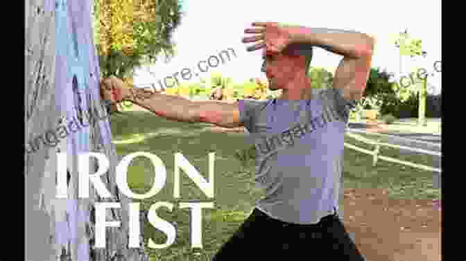 Iron Body Training Practitioner Striking A Tree Trunk With His Bare Fist. Fundamental Iron Skills: Tempering Body And Limbs With Ancient Methods