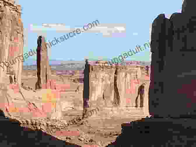 The Shape Of Time Monument In Moab, Utah, Stands Tall And Enigmatic Against The Backdrop Of Red Rock Canyons And A Vast Expanse Of Blue Sky. The Shape Of Time (Merlin In Moab 3)